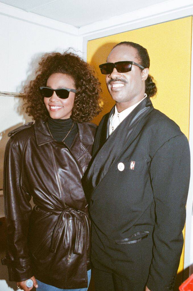 whitney houston and stevie wonder wearing sunglasses