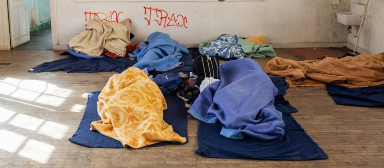 Classroom of an abandoned school converted into a dormitory for young migrants. More than 200 homeless young migrants occupied peacefully a
disused school in Paris.