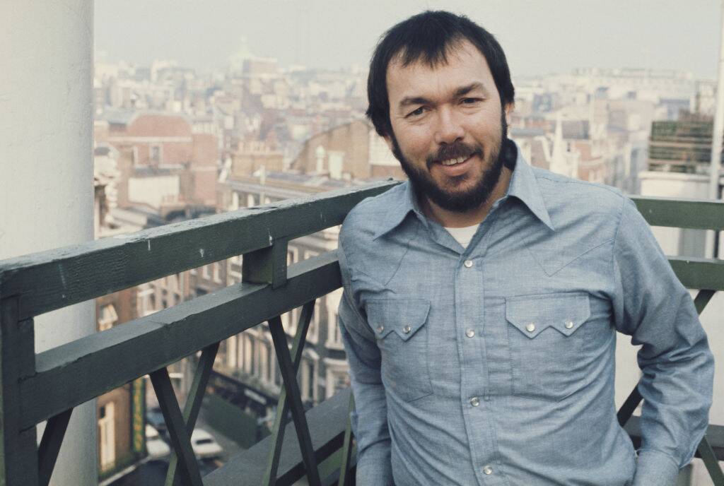 billy swan posing on a London rooftop