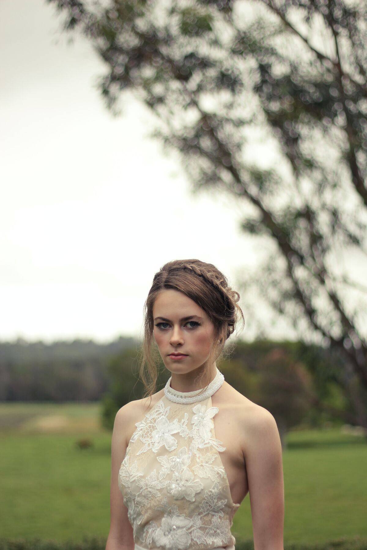 bride looking angry in field