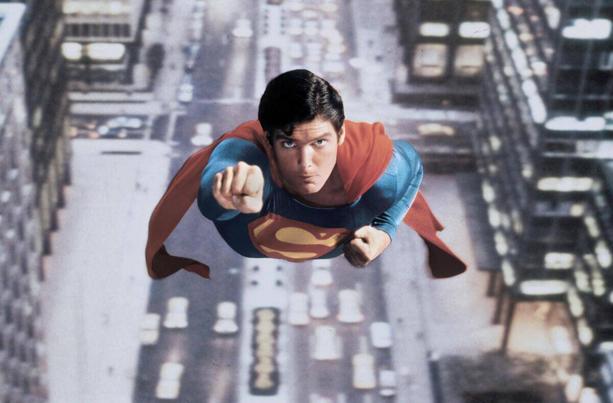 christopher reeve flying wearing the superman costume