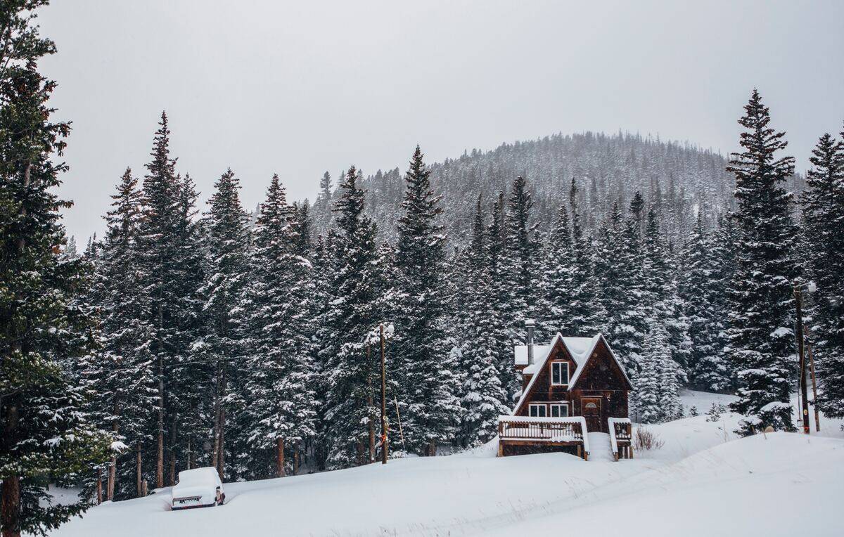 colorado cabin in the snow mountains