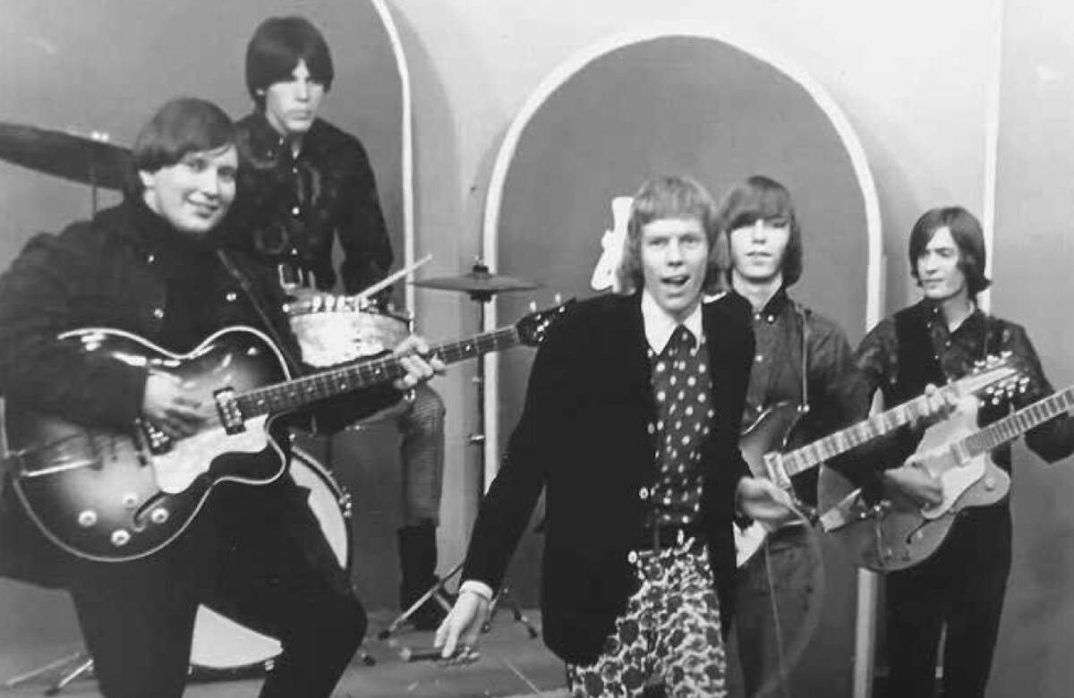 the music explosion playing on stage