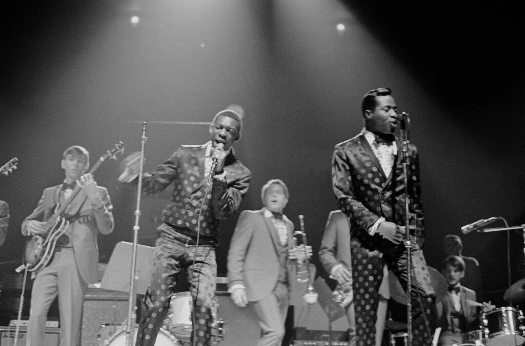 jay and the techniques performing on stage