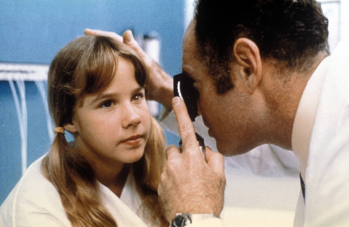 linda blair getting a doctor examination in the exorcist