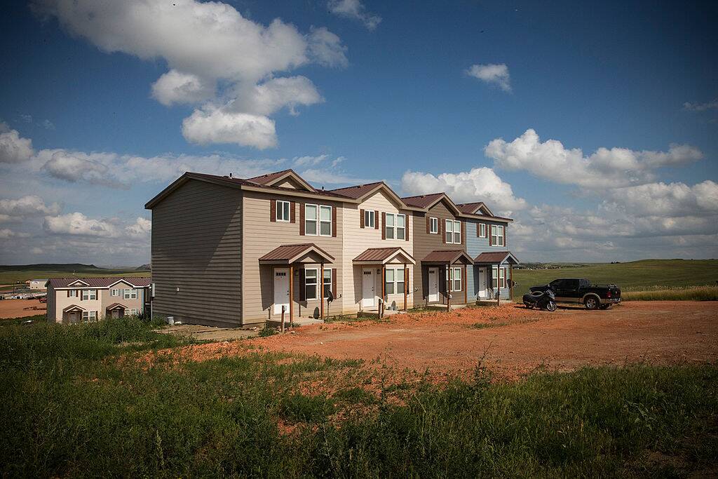 New townhouses are seen next to a highway in north dakota