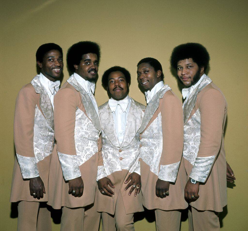 the stylistics wearing matching suits