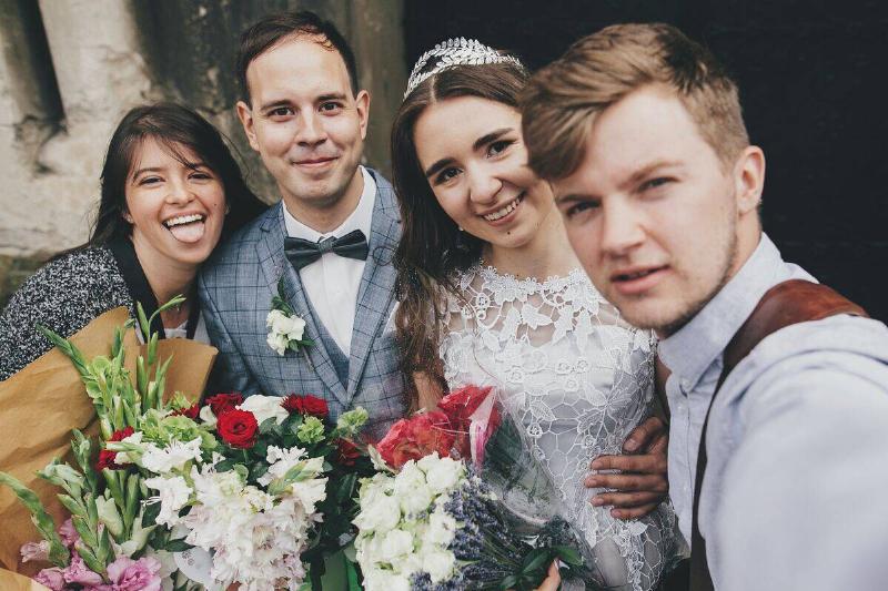 wedding guests looking at camera