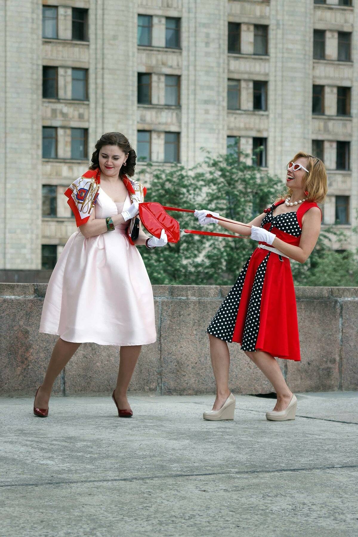 women fighting over lips bag