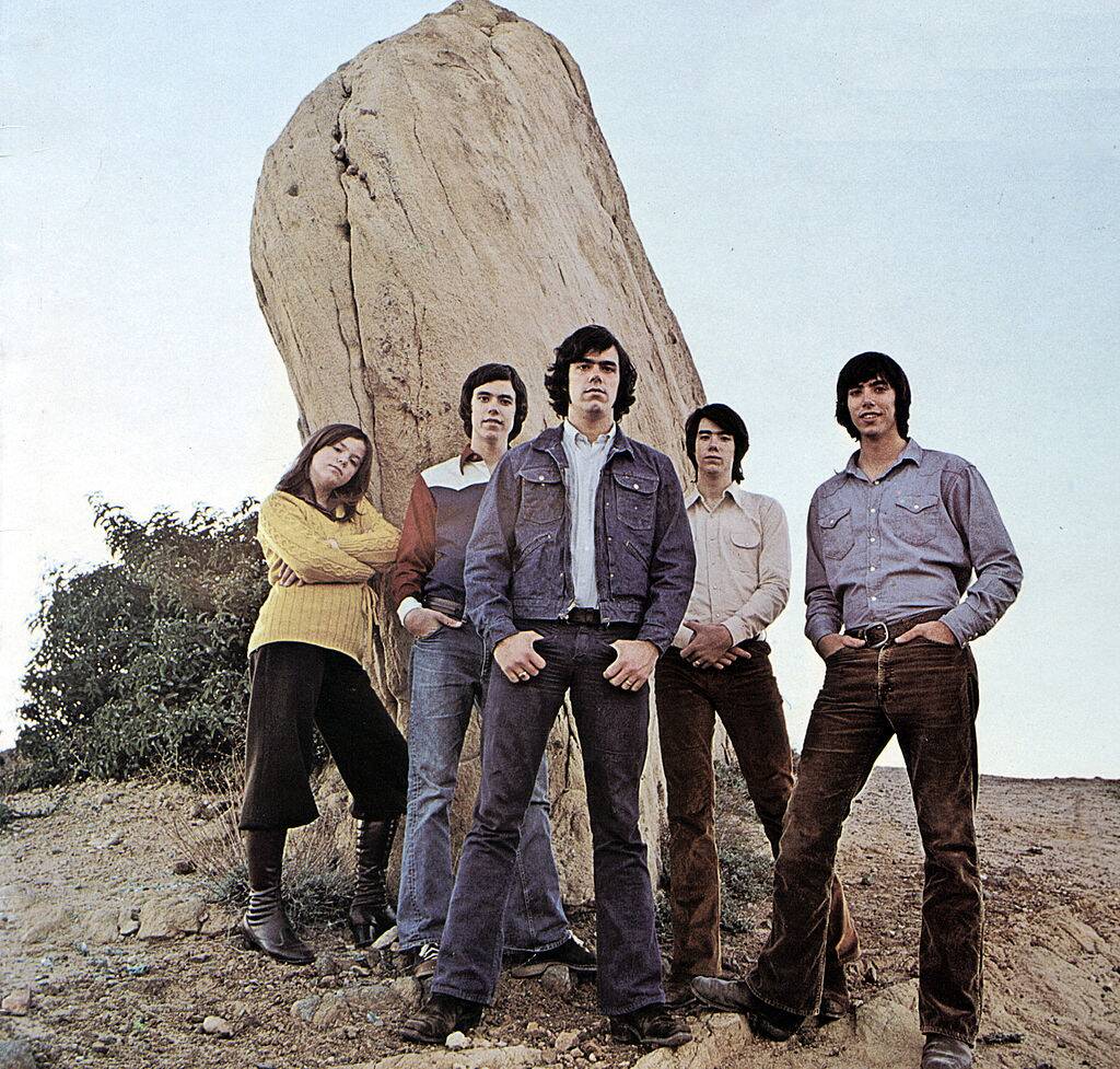 group posing by a tree
