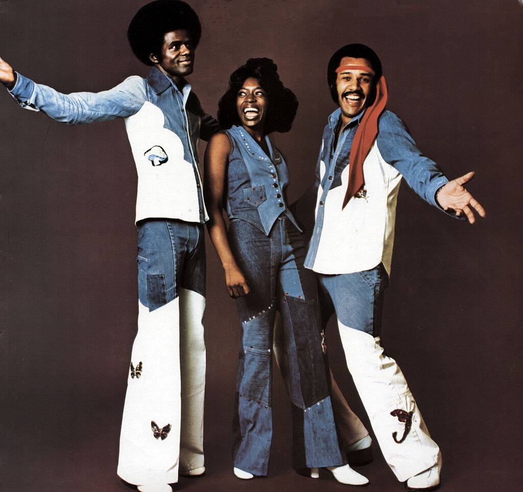 music group posing for a photo