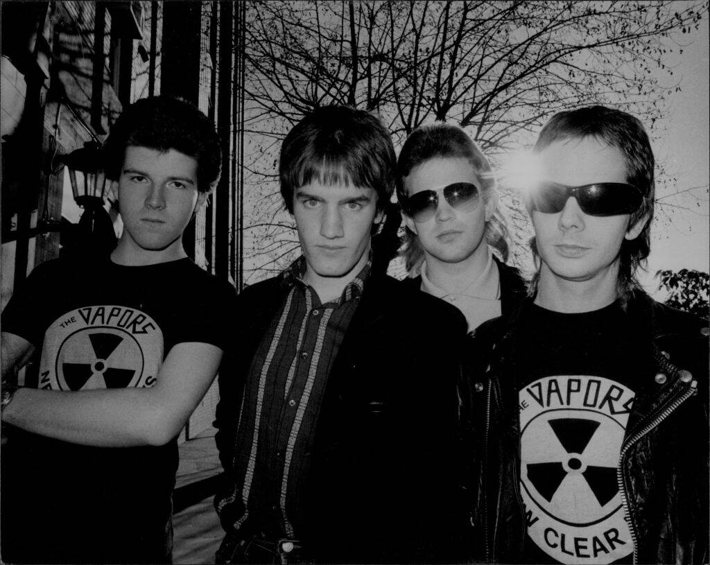 black and white photo of music group