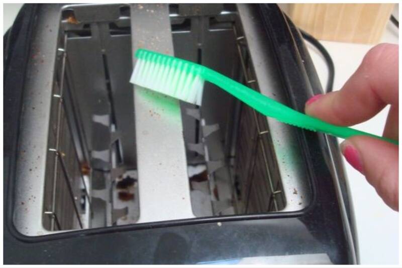 Cleaning toasters with toothbrushes