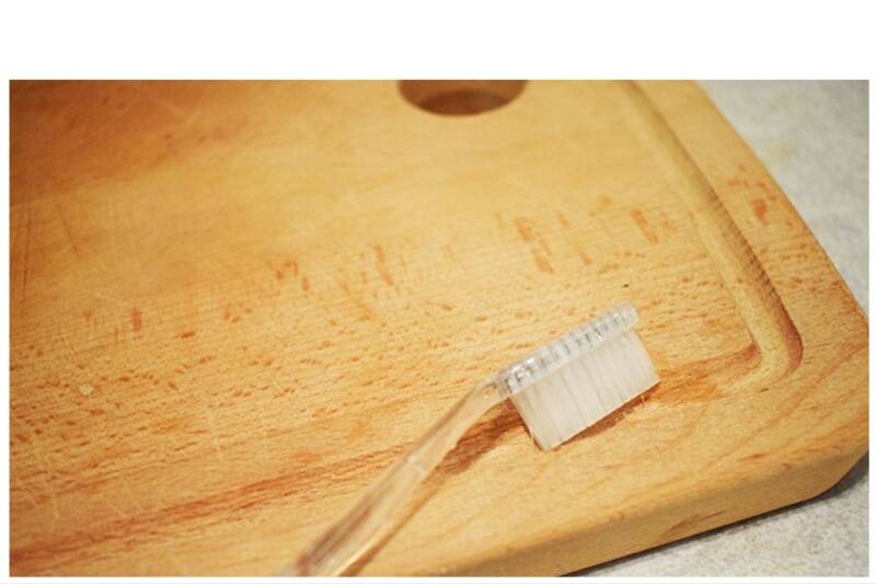 Toothbrush hack to clean cutting board