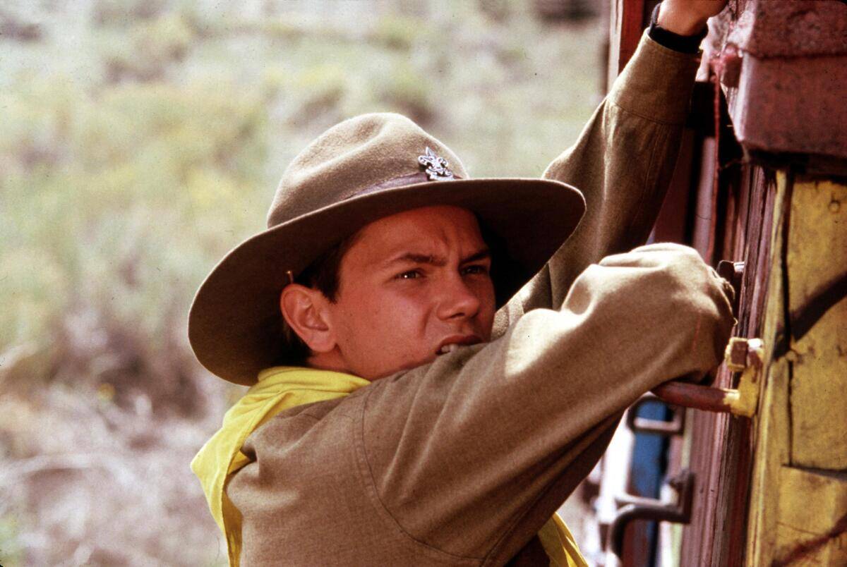 River Phoenix covering chin as Young Indy in Indiana jones And The Last Crusade