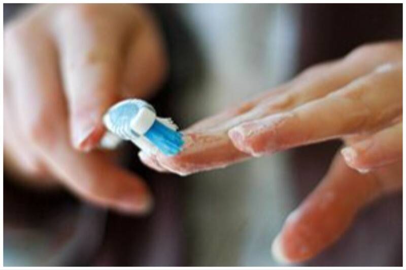 Toothbrush cleaning fingernails