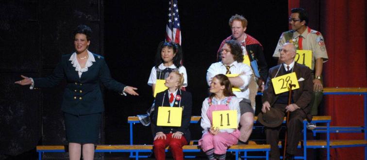 people wearing signs with numbers