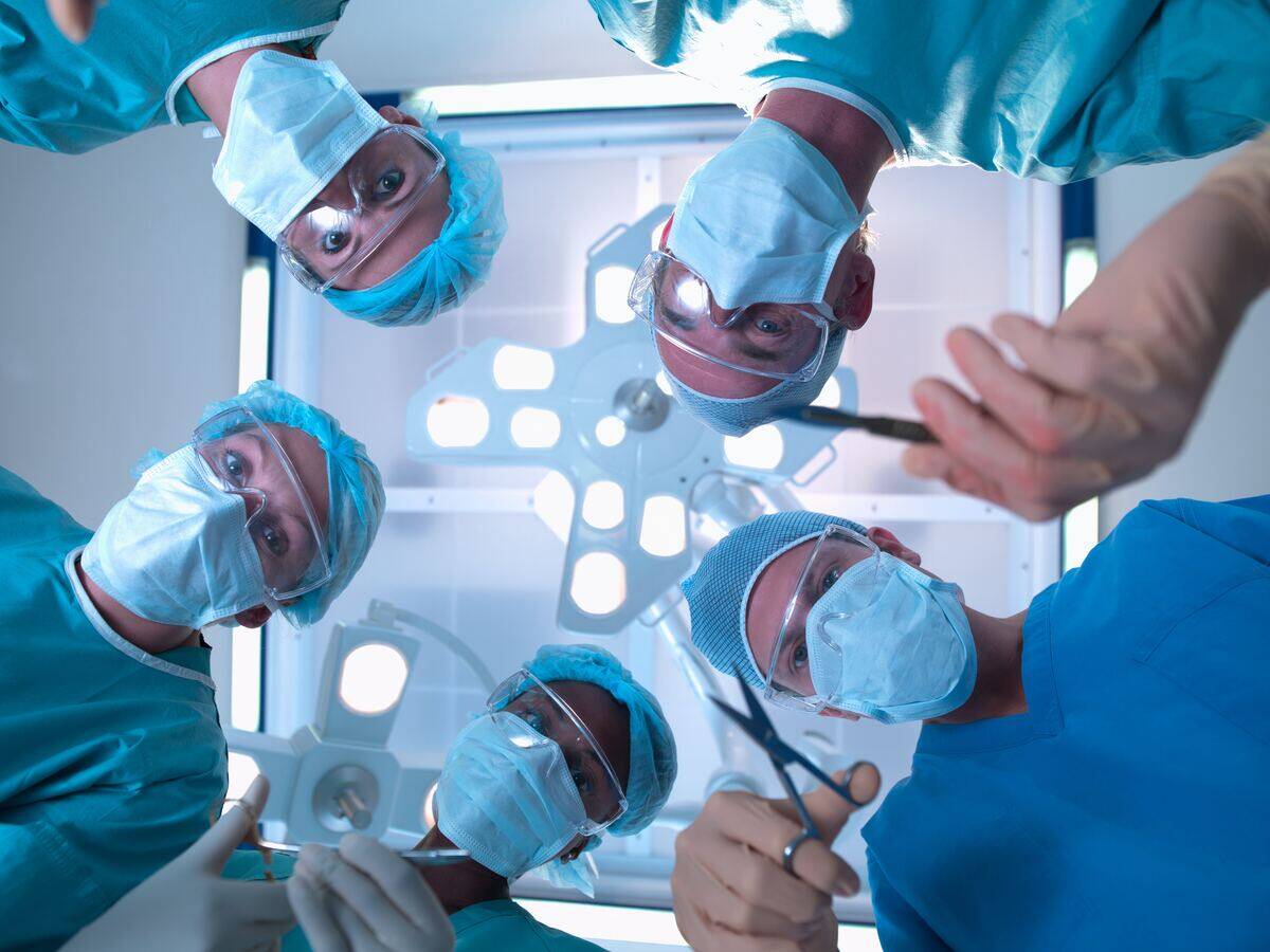 doctors doing surgery