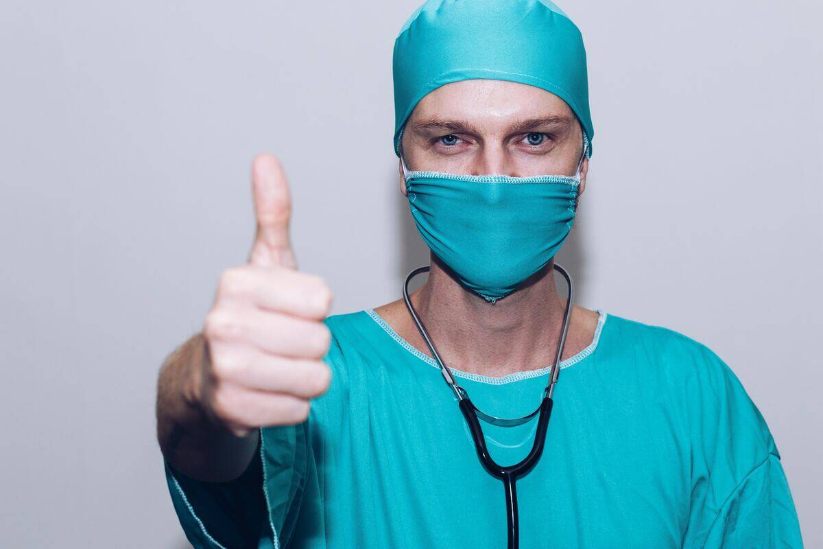 doctor with thumbs up