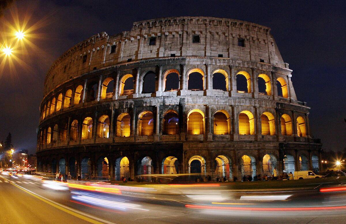 The ancient [redacted] Colosseum is illuminat