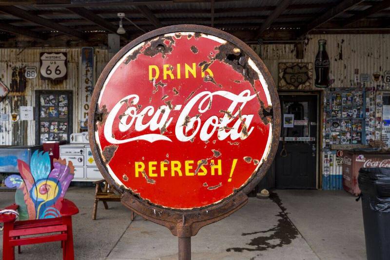 Antique Coca Cola sign along roadside gas station on Route 66, Arizona Antique Coca Cola sign along roadside gas station on Route 66, Arizona