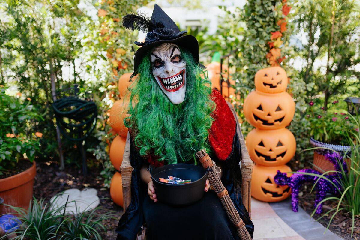 person dressed as a scary witch for halloween