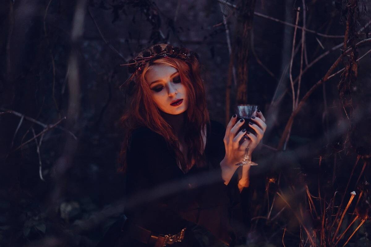 halloween woman dressed in black