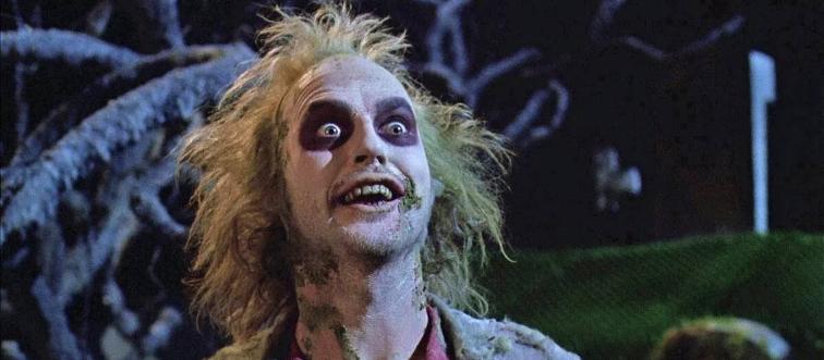 man with makeup and wild hair