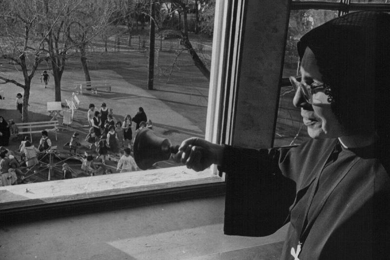 DEC 20 1965, JAN 24 1966, JAN 25 1966; Mother Superior Elizabeth rings her bell to summon the studen