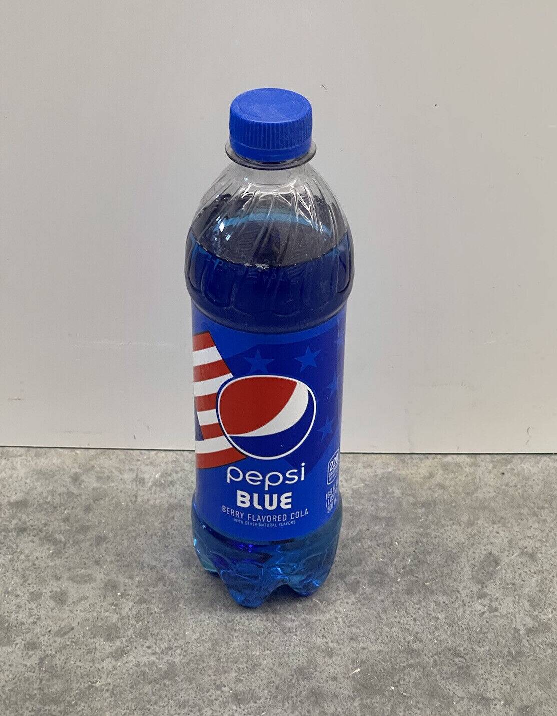 a bottle of blue-colored pepsi