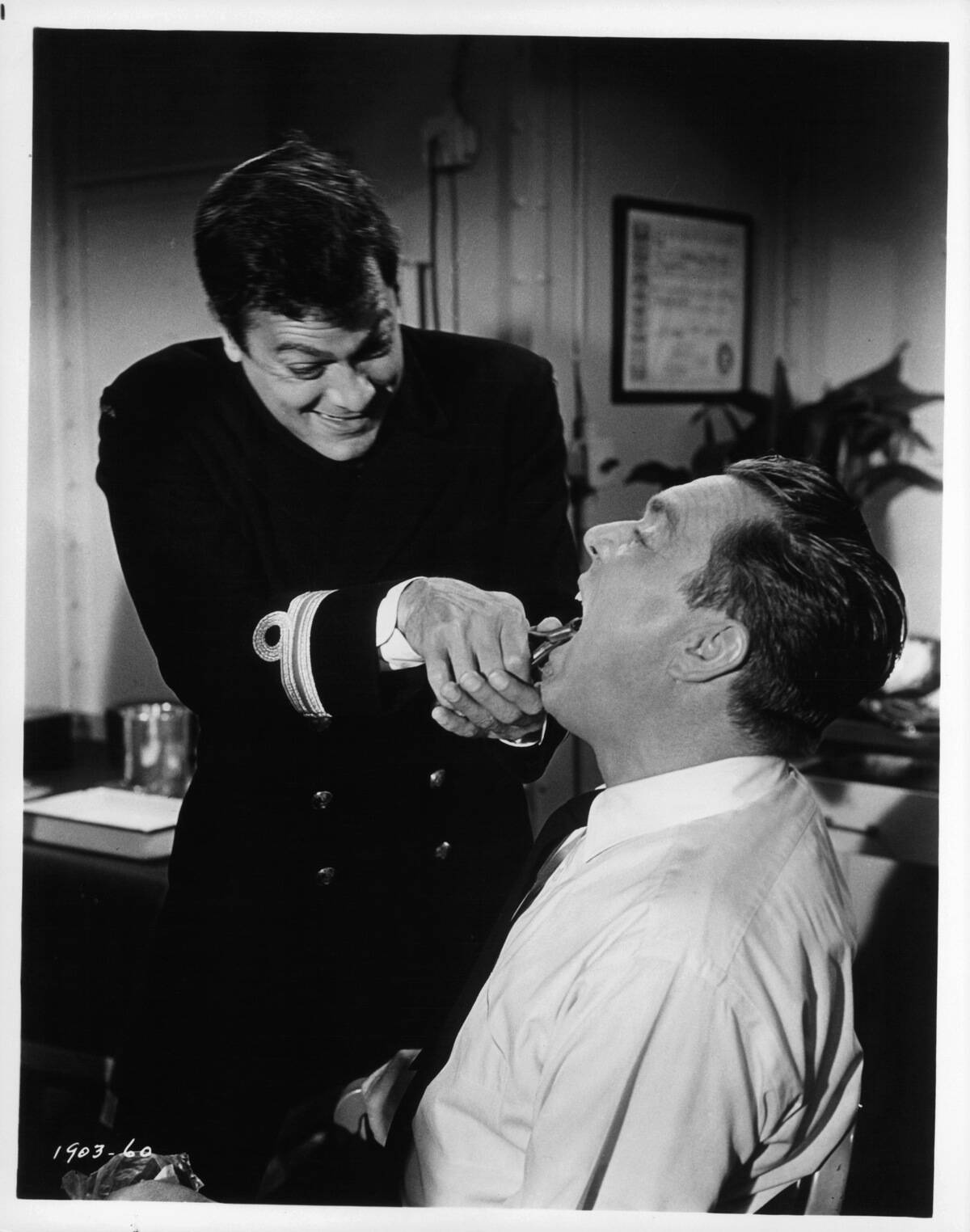 Tony Curtis And Edmond O'Brien In 'The Great Impostor'