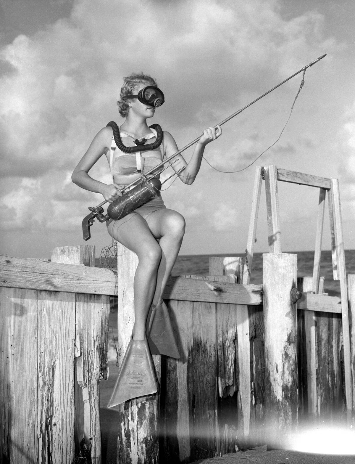 Woman with Scuba Gear and Spear