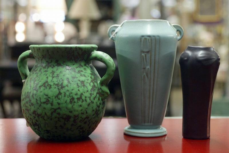 (5/13/04 waltham)Judith Miller at Massachusetts Antiques Cooperative. Roseville art pottery (Staff Photo Michael fein) Saved in AdvNews (5/13/04 waltham)Judith Miller at Massachusetts Antiques Cooperative. Roseville art pottery (Staff Photo Michael fein) Saved in AdvNews