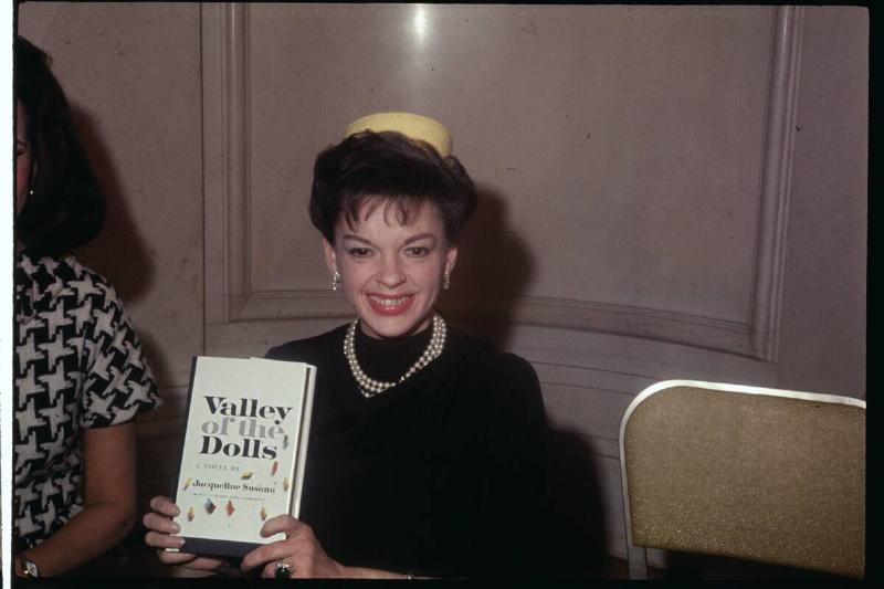 Judy Garland Showing Her Book
