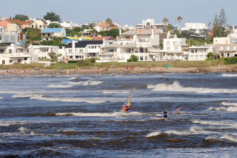 This file picture shows tourists windsur