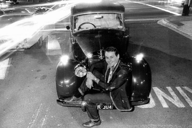 Denis Watkins, producer of lavish musical spectaculars of gross bad taste. He is, among other things, the proud owner of a 1949 triumph renown limousine. Denis Watkins, producer of lavish musical spectaculars of gross bad taste. He is, among other things, the proud owner of a 1949 triumph renown limousine.