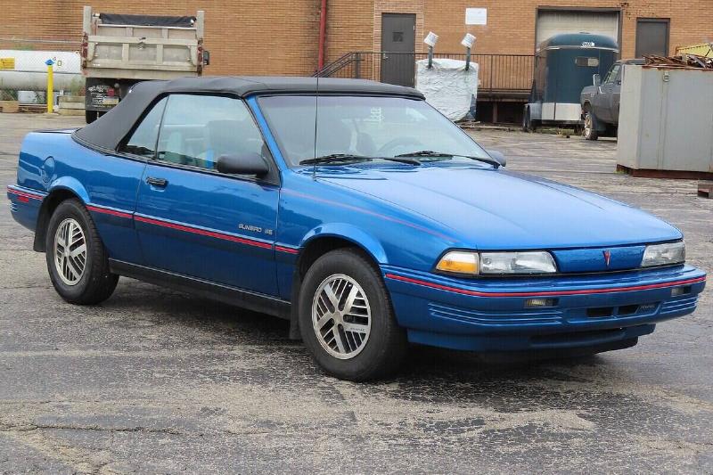 1540px-1992_Pontiac_Sunbird_SE_convertible,_front_right,_09-28-2024 1540px-1992_Pontiac_Sunbird_SE_convertible,_front_right,_09-28-2024