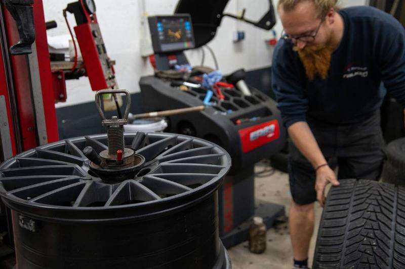 Changing tires in a garage
