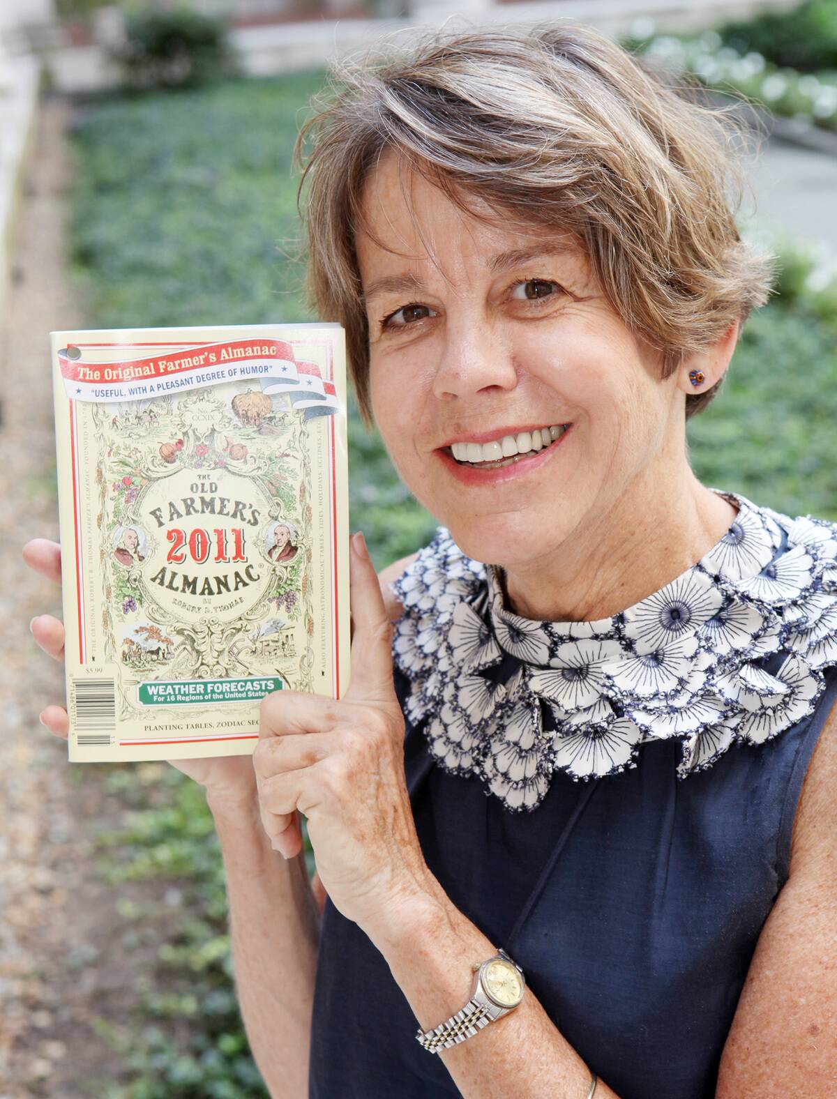 Janice Stillman, editor of the Farmer's Almanac, with the 2011 edition. 