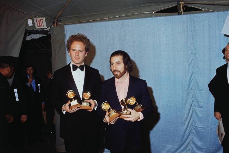 Art Garfunkel and Paul Simon Holding Grammy Awards