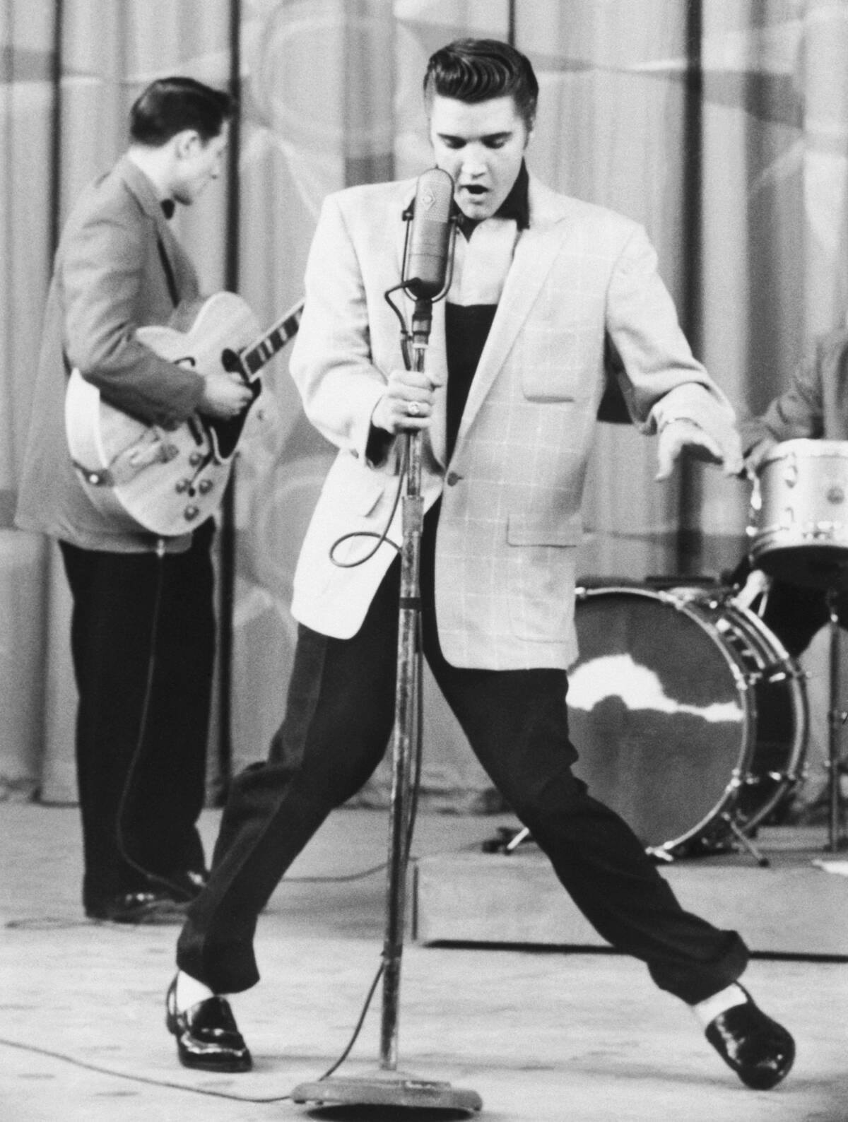 Elvis Presley performing on stage