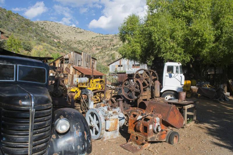 Old mining equipment, cars and trucks at the historic Gold...