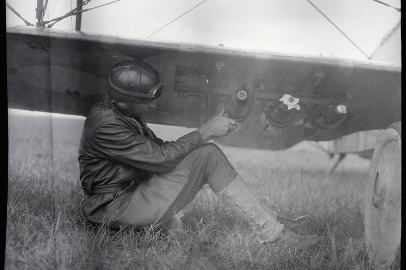 American Pilot Attaching Bombs to Plane