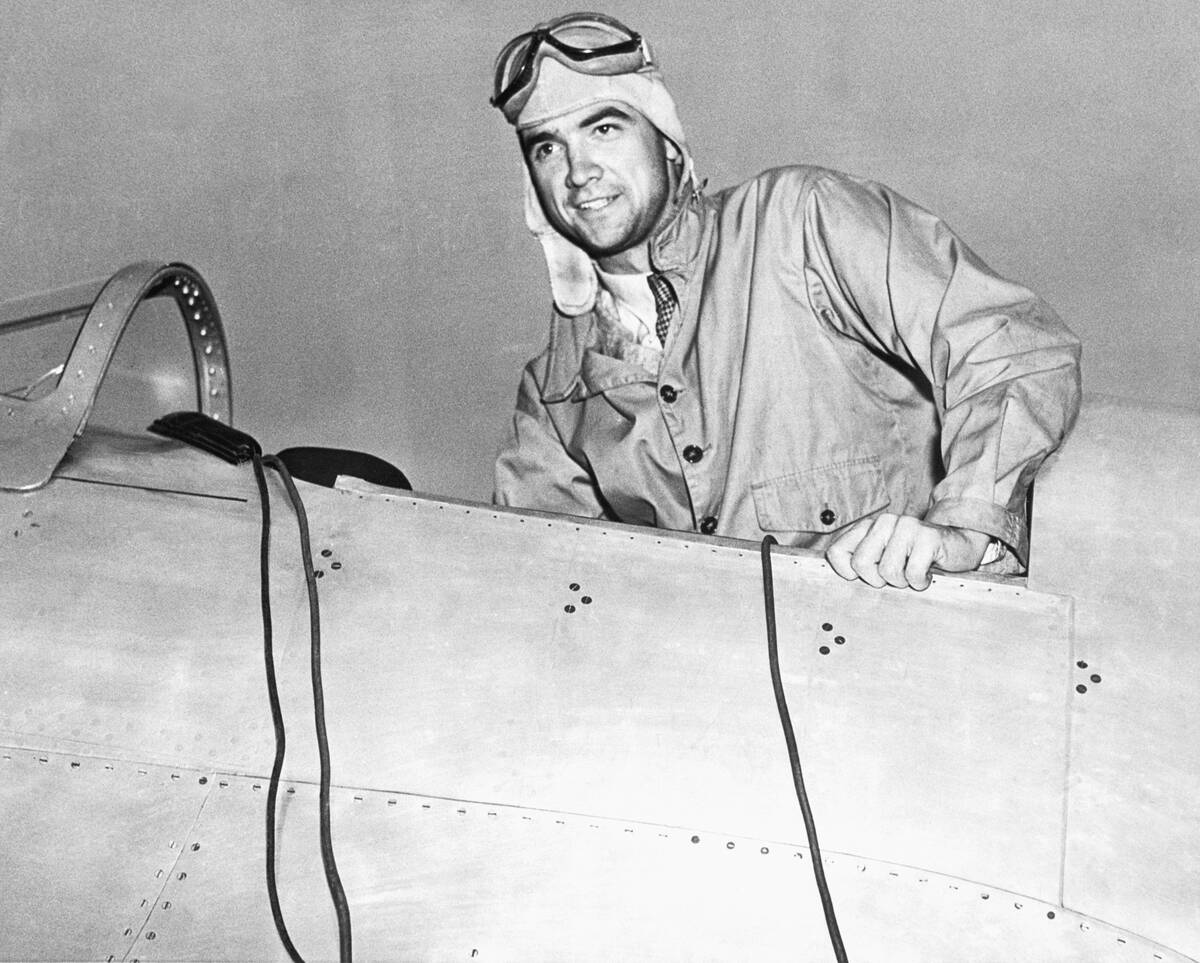 Howard Hughes in Cockpit of Airplane