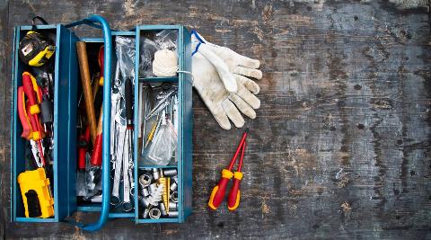 Box of tools and gloves.
