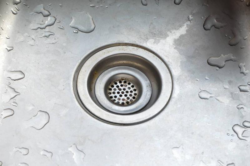 close-up-shot-of-a-clean-sink-hole-2025-03-10-14-05-12-utc A clean drain.