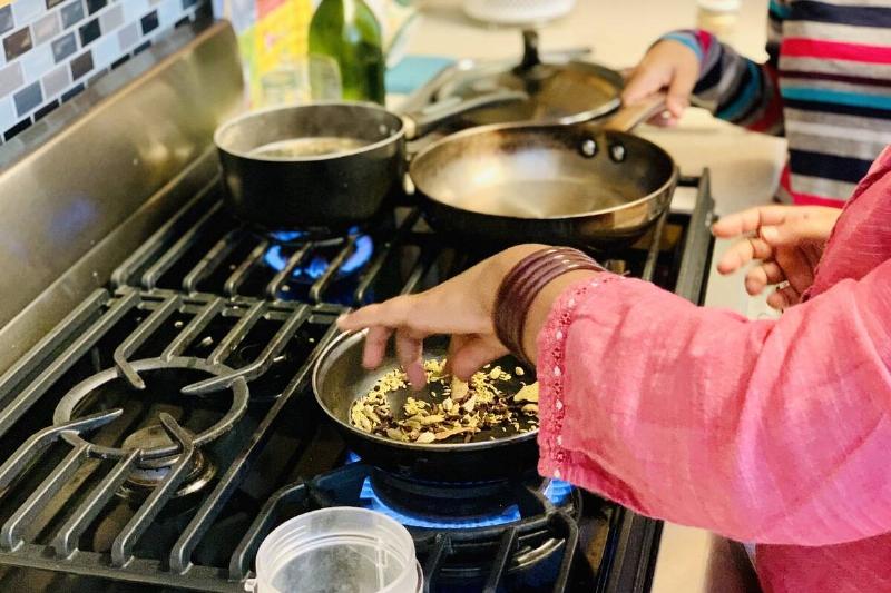 Cooking on the stovetop burners.
