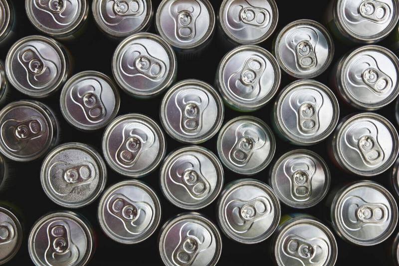 Overhead view of unopened soda cans