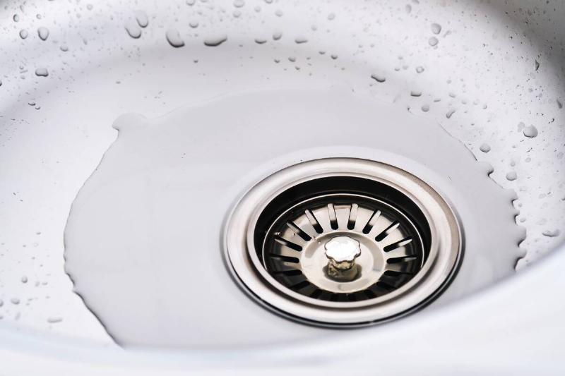 stainless-steel-sink-with-splash-of-water-2025-03-15-18-43-39-utc Backed up drain.