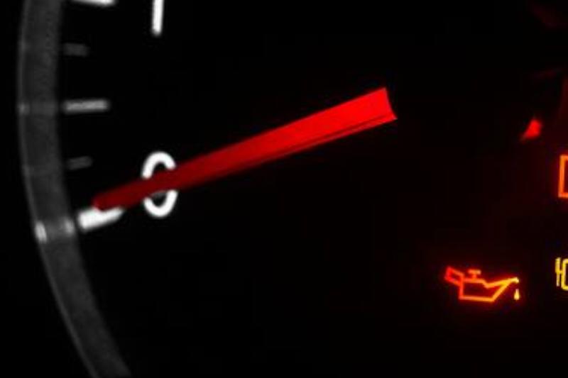 the-car-dashboard-with-a-speedometer-2025-03-12-22-12-55-utc Oil pressure warning light.